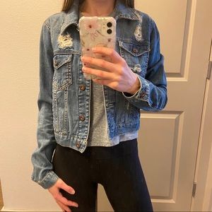 Distressed denim jacket